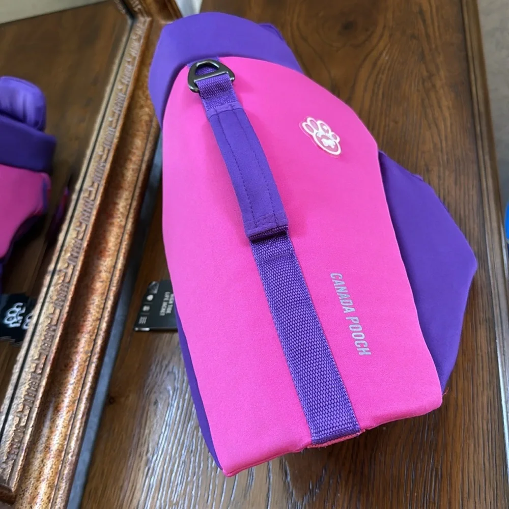 New High Tide life jacket by Canada Pooch for swimming. Pink and Purple. Size 18
